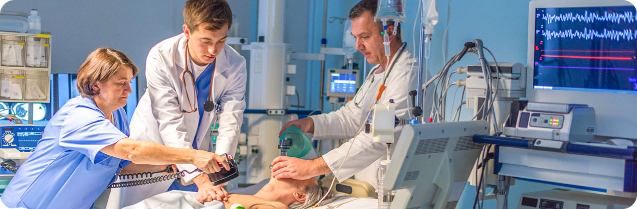 Health Care professionals attending a patient - get your ACLS recertification online